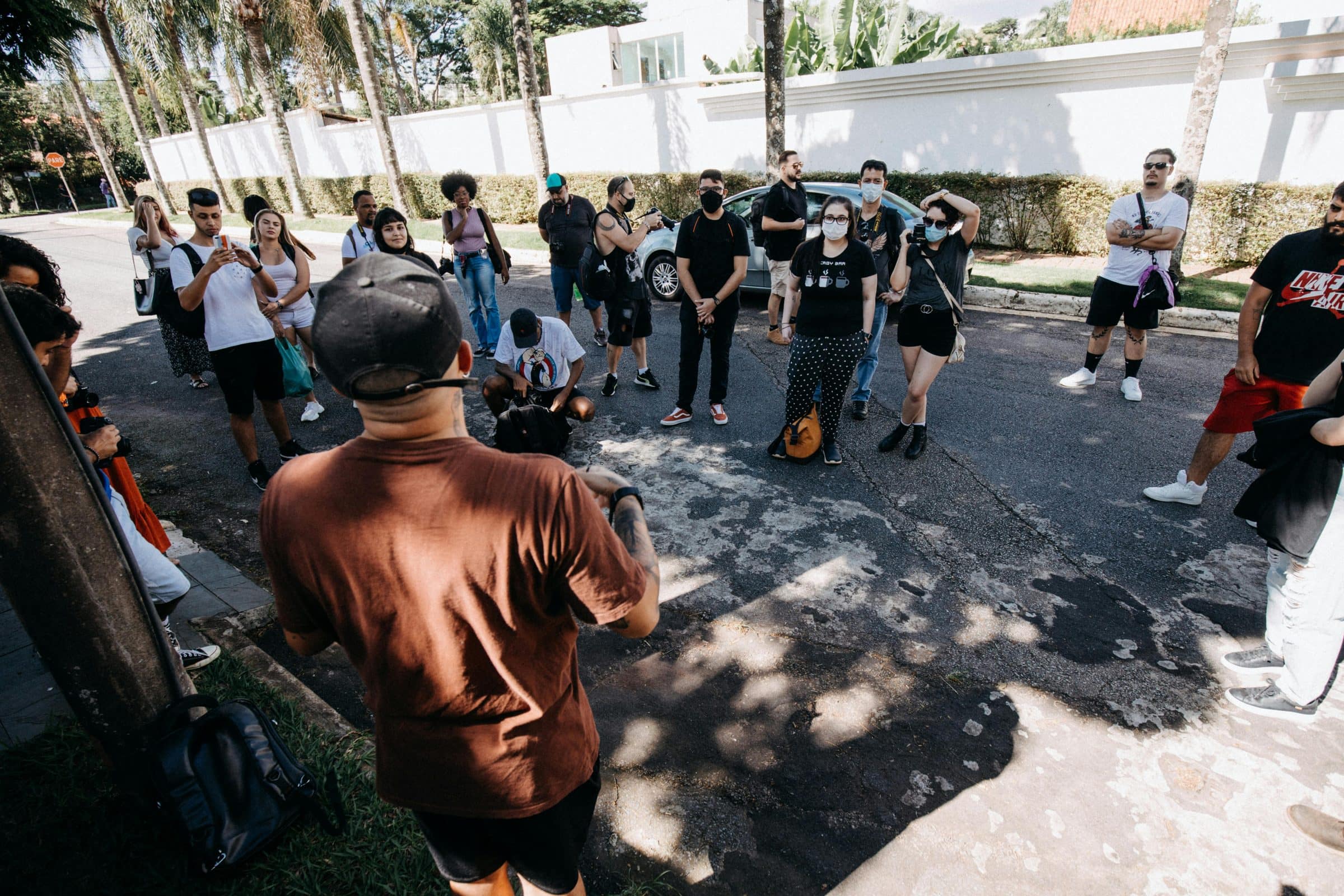 A local guide briefing a traveler group before the tour continues.